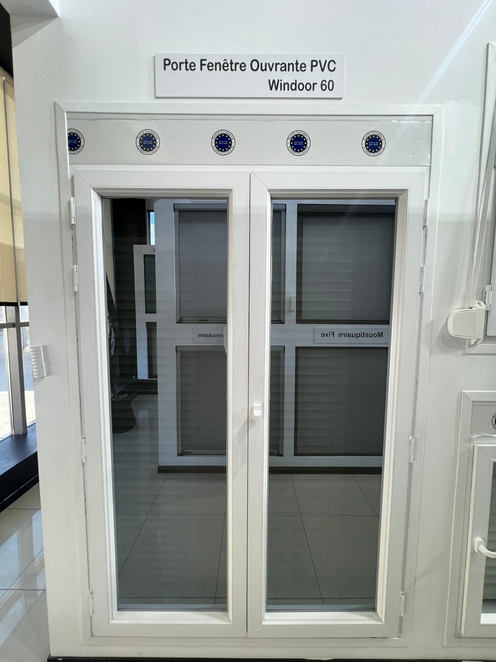 نافذة-باب مفصلية PVC Windoor 60 مع ناموسية مدمجة - All Stores Algérie